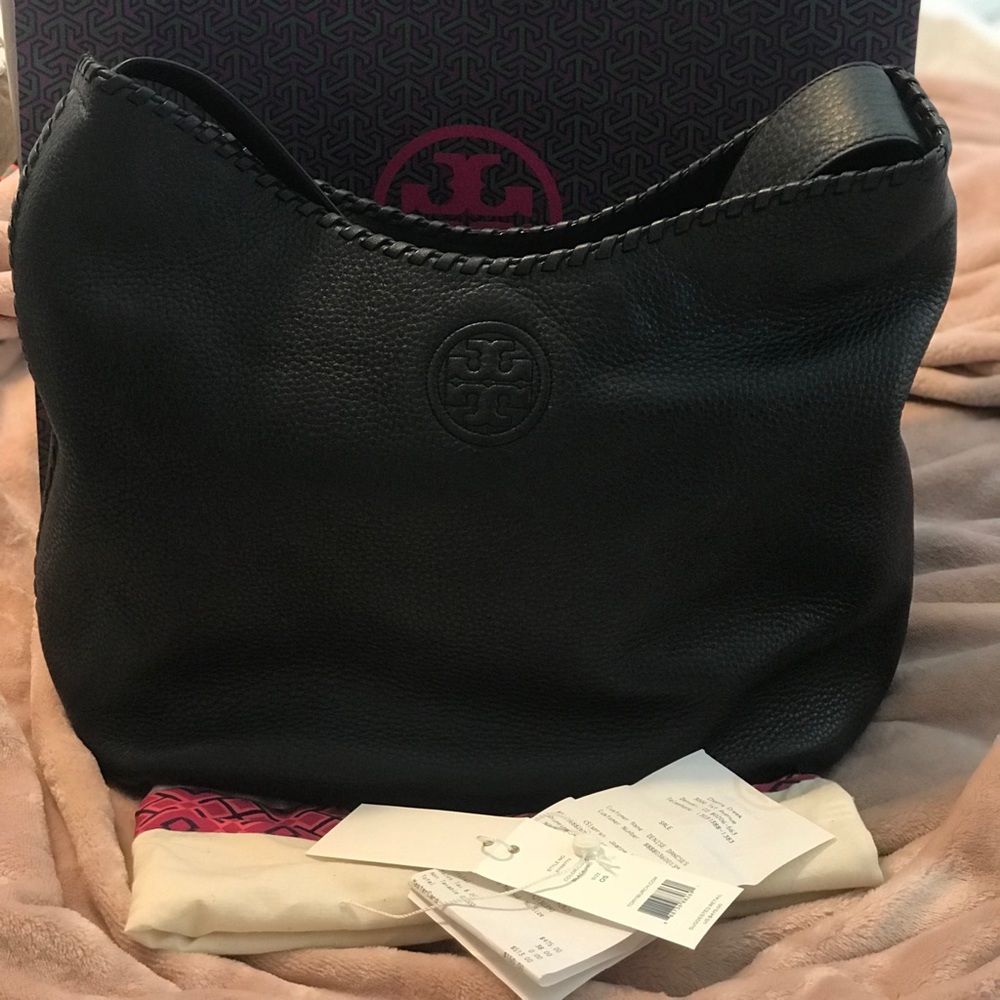 Tory Burch authentic handbag ( tags) included